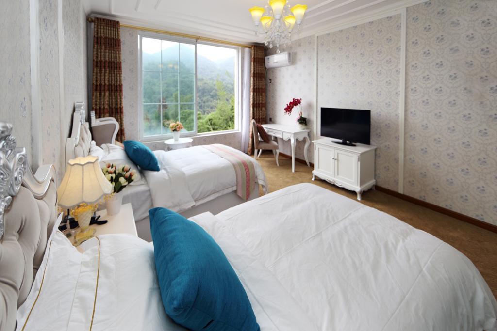Panshan Tingquan Tuwo Holiday Resort 乐山 客房 照片